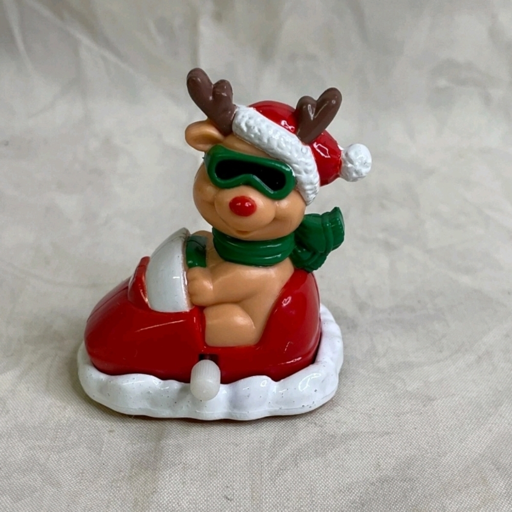 Festive Reindeer Figurine with Red and Green Accents